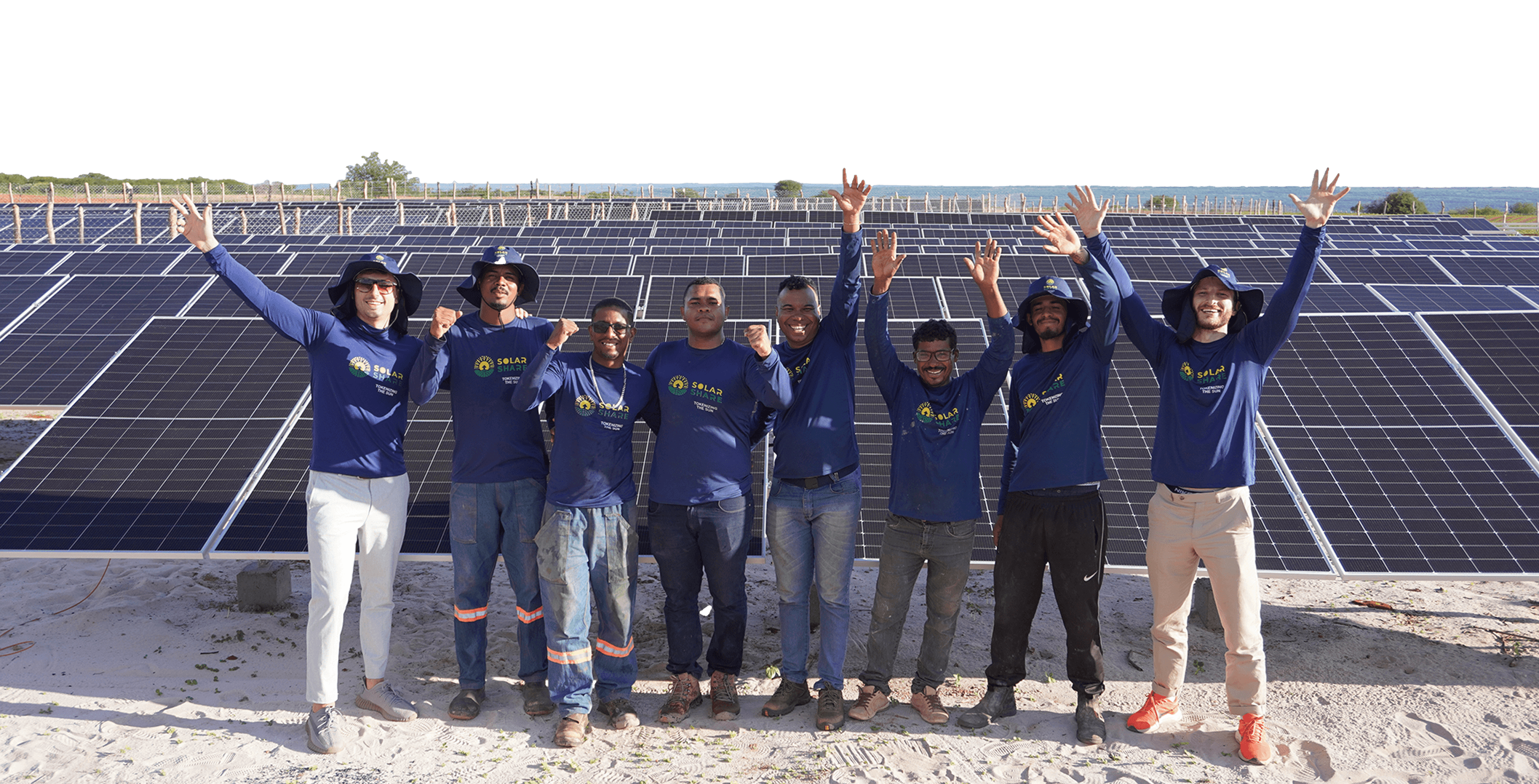 SolarShare team celebrating at solar farm